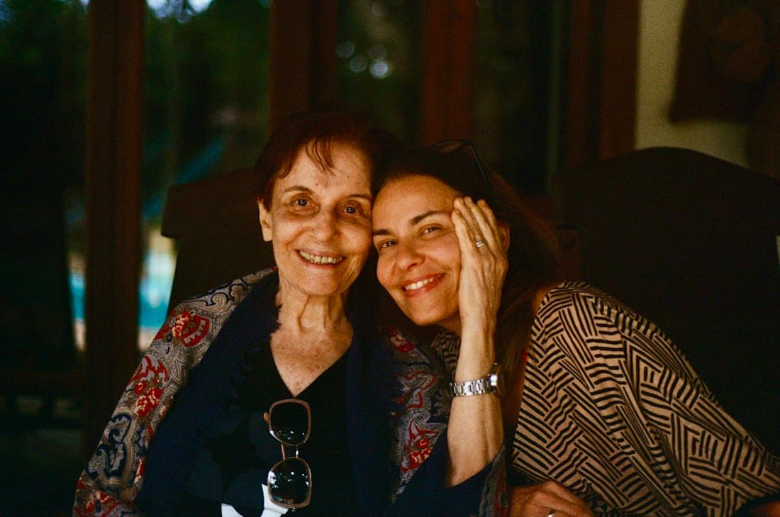 Senior mother and adult daughter embracing